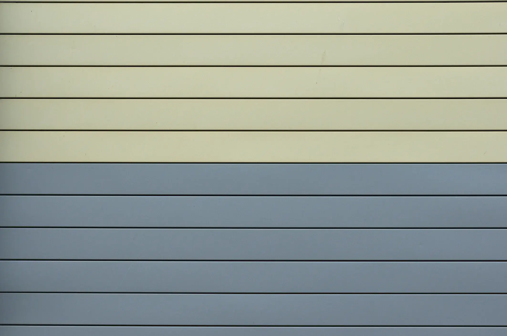 Painted aluminum siding in blue and tan, Atlanta, Georgia, by Kimberly Painting