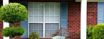 Brick Ranch house with blue shutters-Kimberly Painting-Atlanta GA