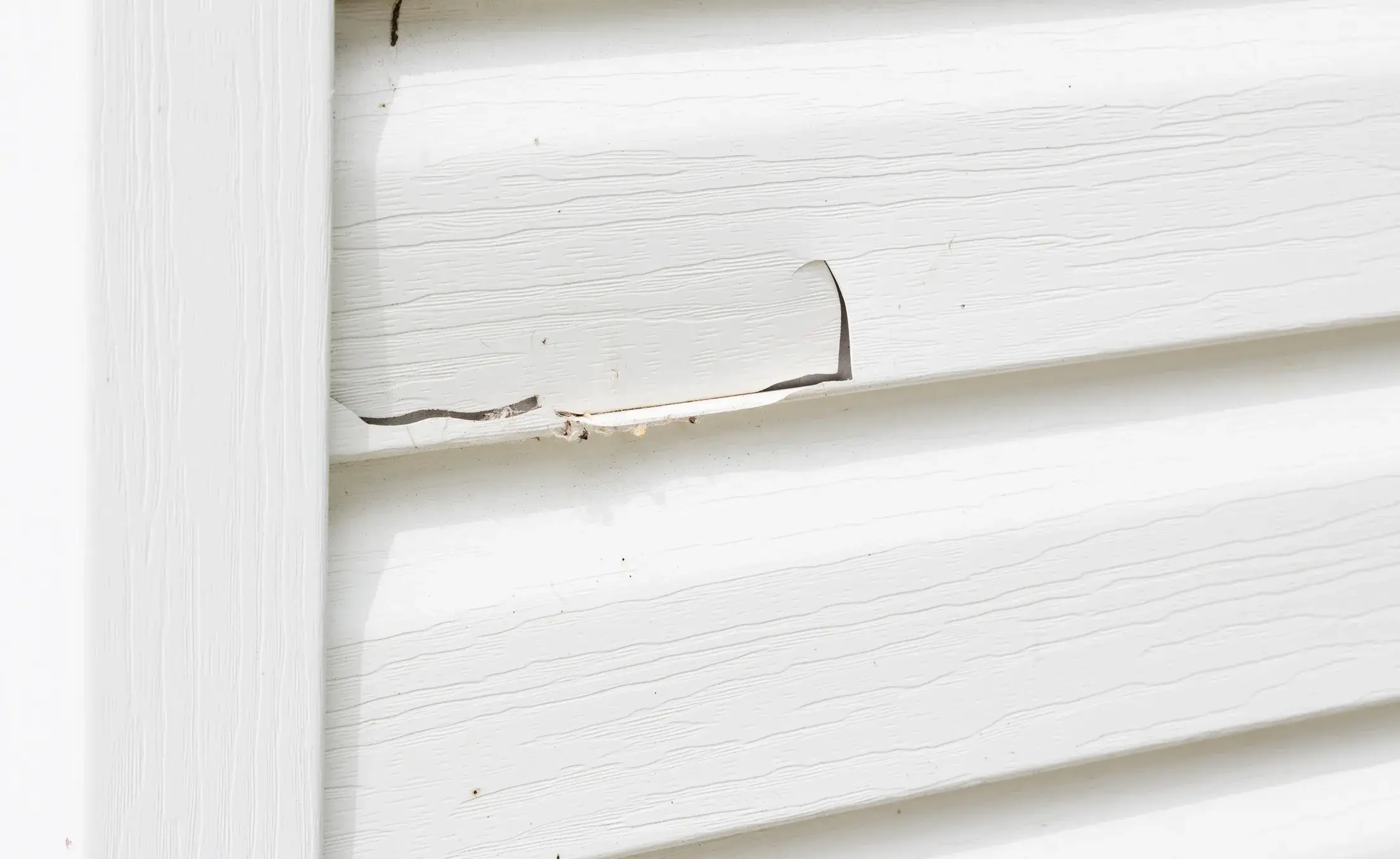 Damaged siding repaired by Kimberly Painting in Cumming, Georgia