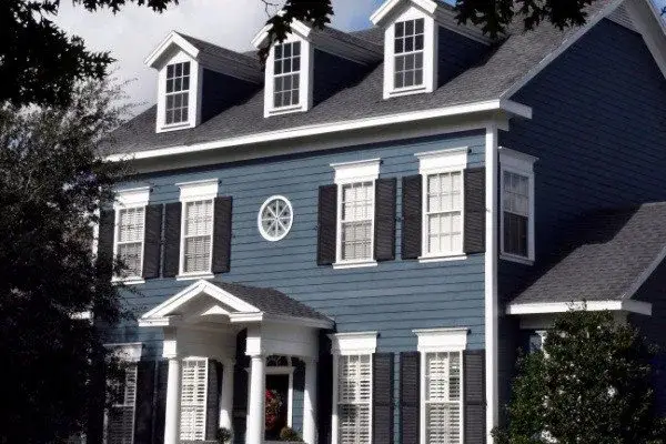 Colonial Home Exterior Painting - Blue Body with Black Shutters and White Trim - Kimberly Painting 600x400