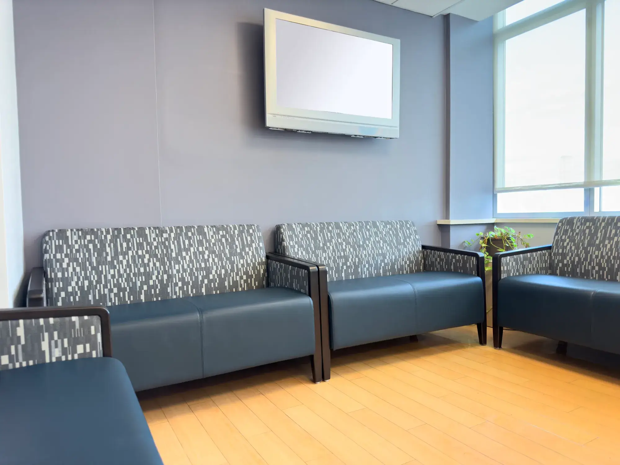 A doctor's office waiting room with painted walls
