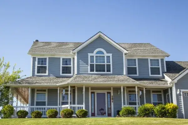 Exterior Paint Colors-Gray Roof and Blue Siding-Kimberly Painting-600x400
