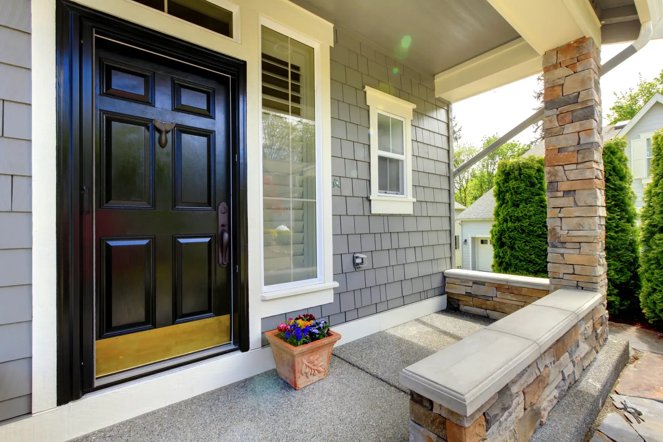 Porch painting and repair near Buckhead, Georgia: black door with white trim by Kimberly Painting