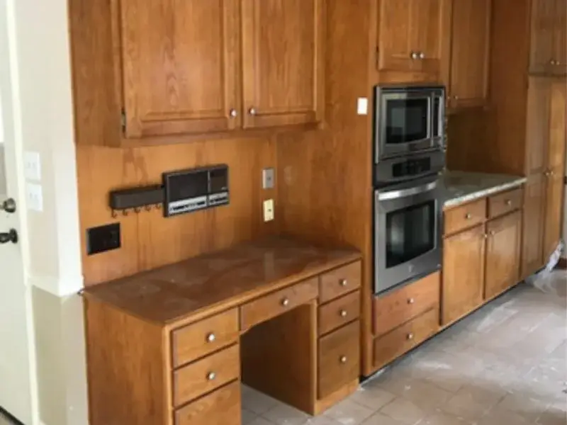 Light oak cabinets painted white and sea blue, before