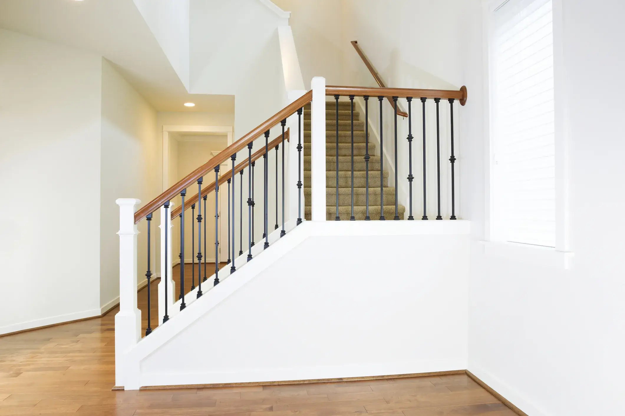 Grand staircase in the entryway of a luxury home