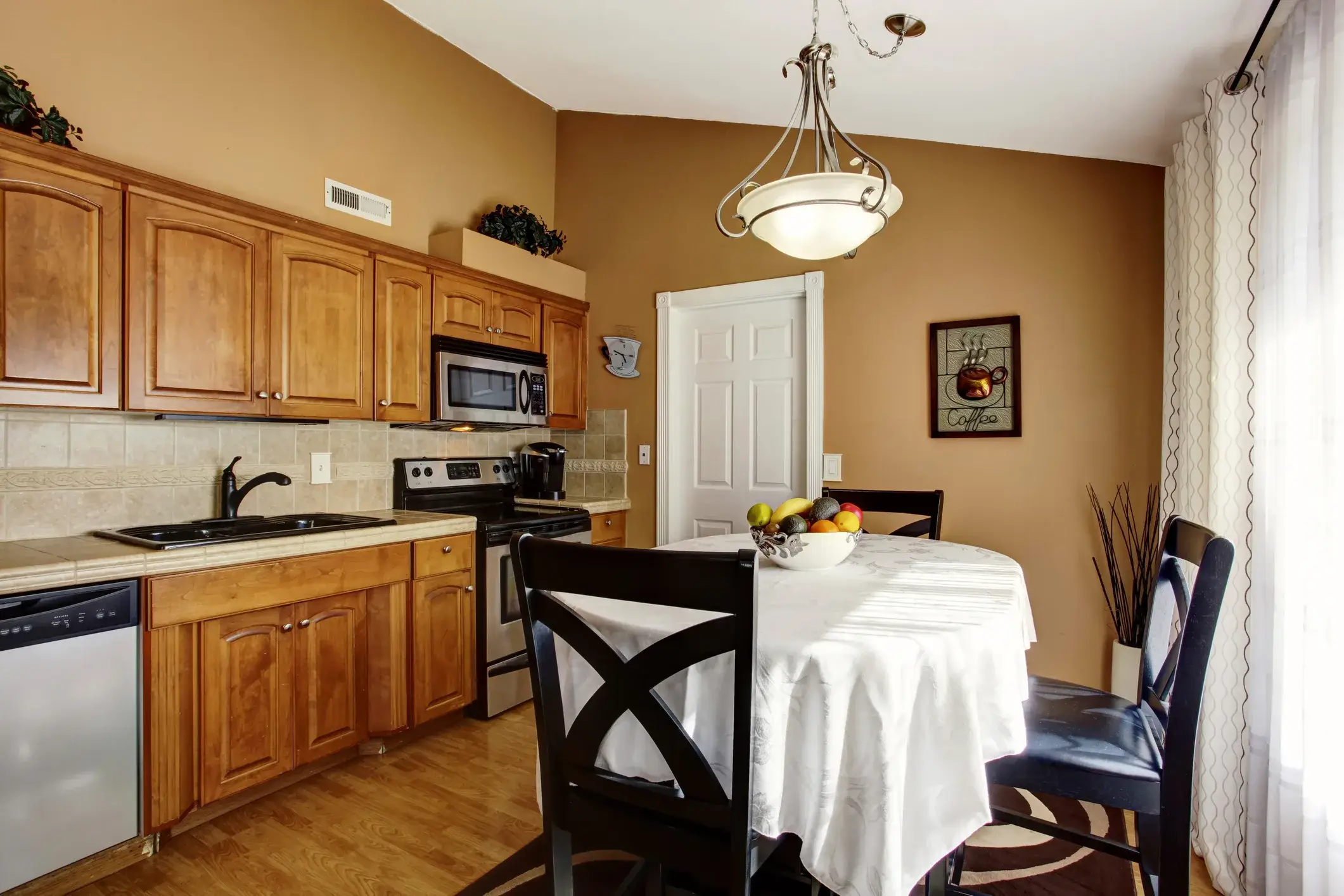 Dark brown kitchen paint colors on the wall