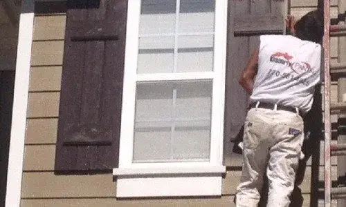 Pro vs DIY-Working on Window-Buckhead GA-Kimberly Painters-500x300