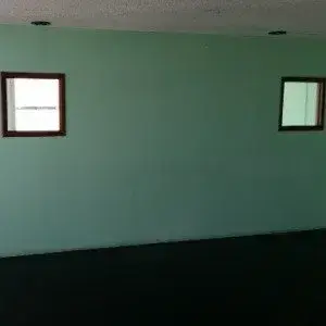 A commercial office interior painted blue to promote relaxation and vitality