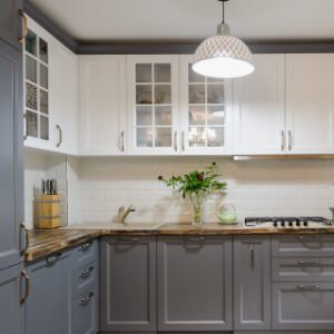 Two-tone Atlanta kitchen with white upper and dark gray lower cabinets