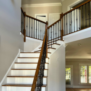 Grand staircase in entryway of luxury home - interior painting in Chastain park